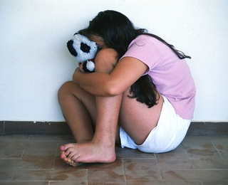 A depressed loser cowers in a corner. According to a new Stanford University study, there is no hope for such people.